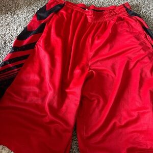 Red Nike shorts